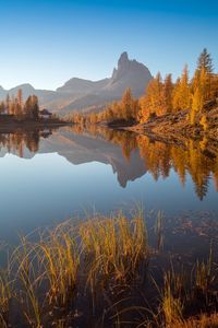 Scenic view of lake against sky during autumn
