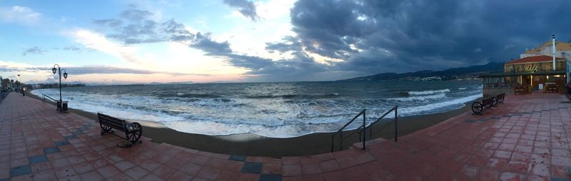 Scenic view of sea against cloudy sky