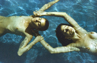 Woman swimming in sea