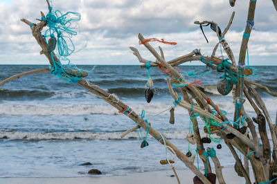 A composition of sticks and stones. installation on the seashore.