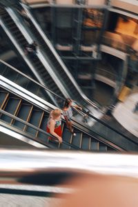 High angle view of people on escalator