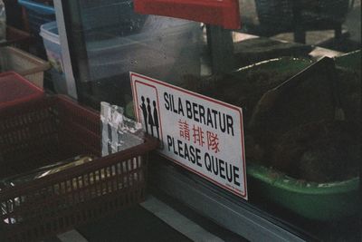 Information sign on glass window