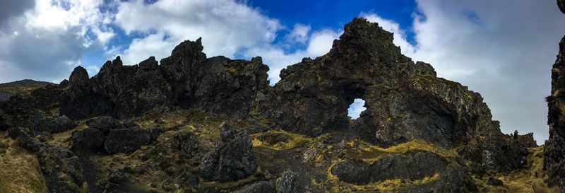 Panoramic view of rock formations against sky