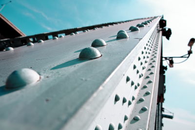 Close-up of ball on metallic structure