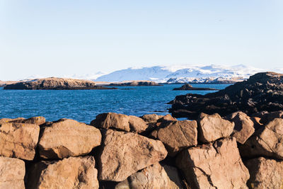 Scenic view of sea against clear sky