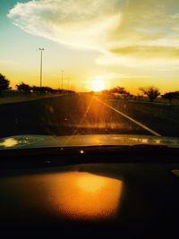 Sunset over road