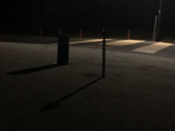 Empty road in city at night