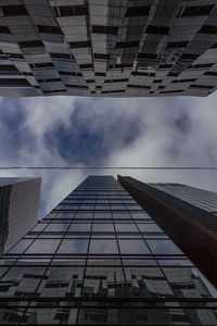 Low angle view of skyscrapers against sky