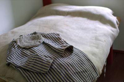 Close-up of blanket on bed at home