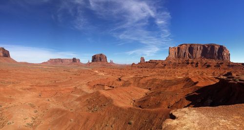 Rock formations in desert against sky