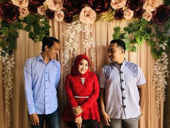 Young couple standing at home