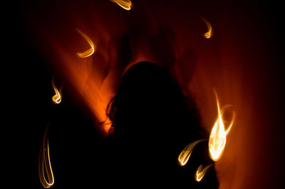View of fire in dark room