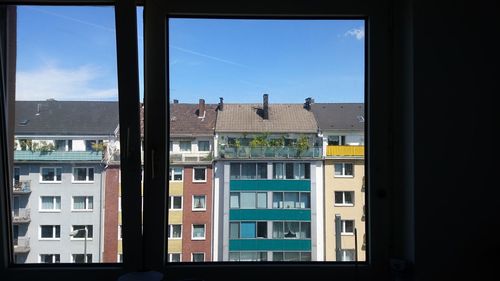 View of buildings through window