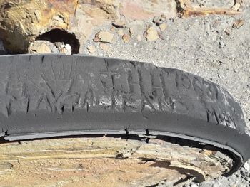 High angle view of tire tracks on street