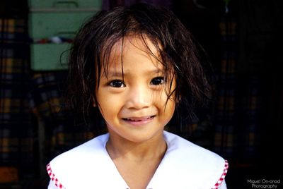 Close-up portrait of smiling girl