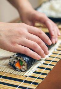 Close-up of man holding food
