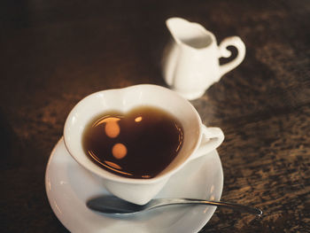 Close-up of coffee cup on table