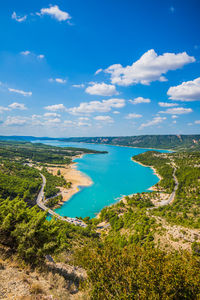 Scenic view of landscape against blue sky