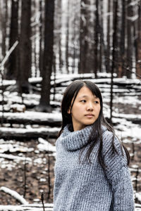 Portrait of woman in forest