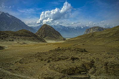 Panoramic view of landscape and mountains against sky