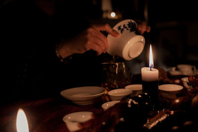 Close-up of illuminated tea light candles