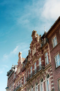 Low angle view of church against sky in town