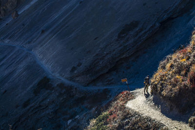 High angle view of rocks on sea shore