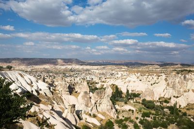 Panoramic view of landscape against cloudy sky