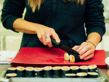 Cropped image of woman holding hands