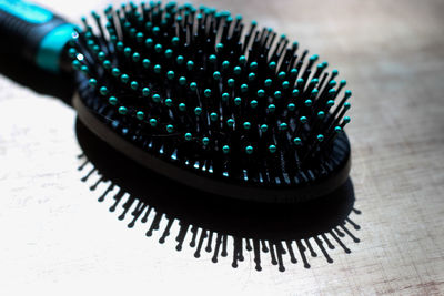 High angle view of bristle hair brush