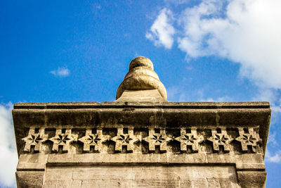 Low angle view of temple against blue sky