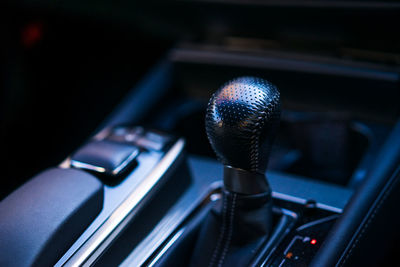 Close-up of gearshift in car