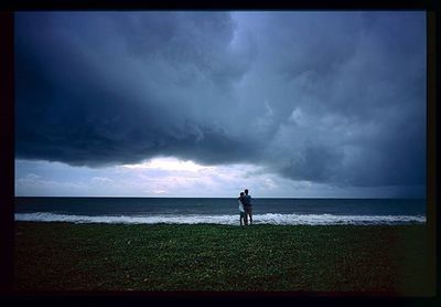 Scenic view of sea against cloudy sky