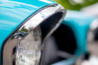 Reflection of car on side-view mirror