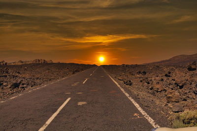 Road against sky during sunset