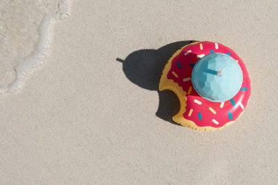 High angle view of toy at beach