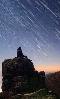 Scenic view of star field against sky at night