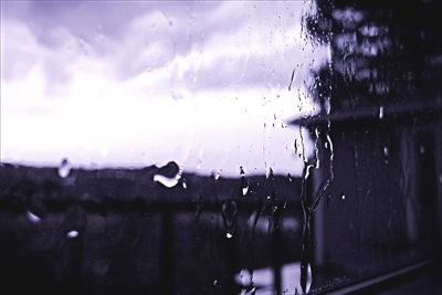 Close-up of water drops on glass