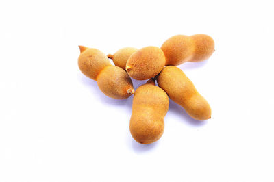 Close-up of cake against white background