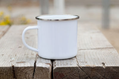 Close-up of coffee cup on table