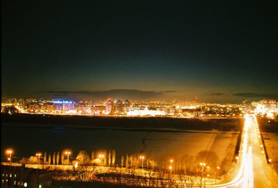 Illuminated cityscape at night