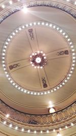 Low angle view of illuminated ceiling