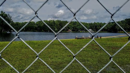 Field seen through chainlink fence