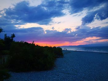 Scenic view of sea at sunset