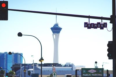 Low angle view of communications tower against clear sky