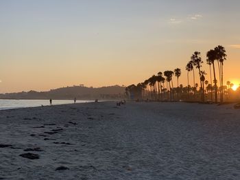 Scenic view of beach during sunset