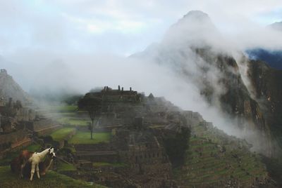 Scenic view of machu picchu against sky