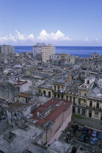 High angle view of buildings in city against sky