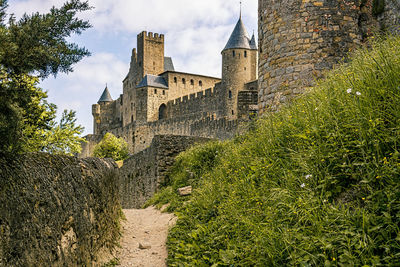 Low angle view of old building against sky
