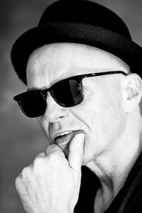 Close-up portrait of man wearing sunglasses